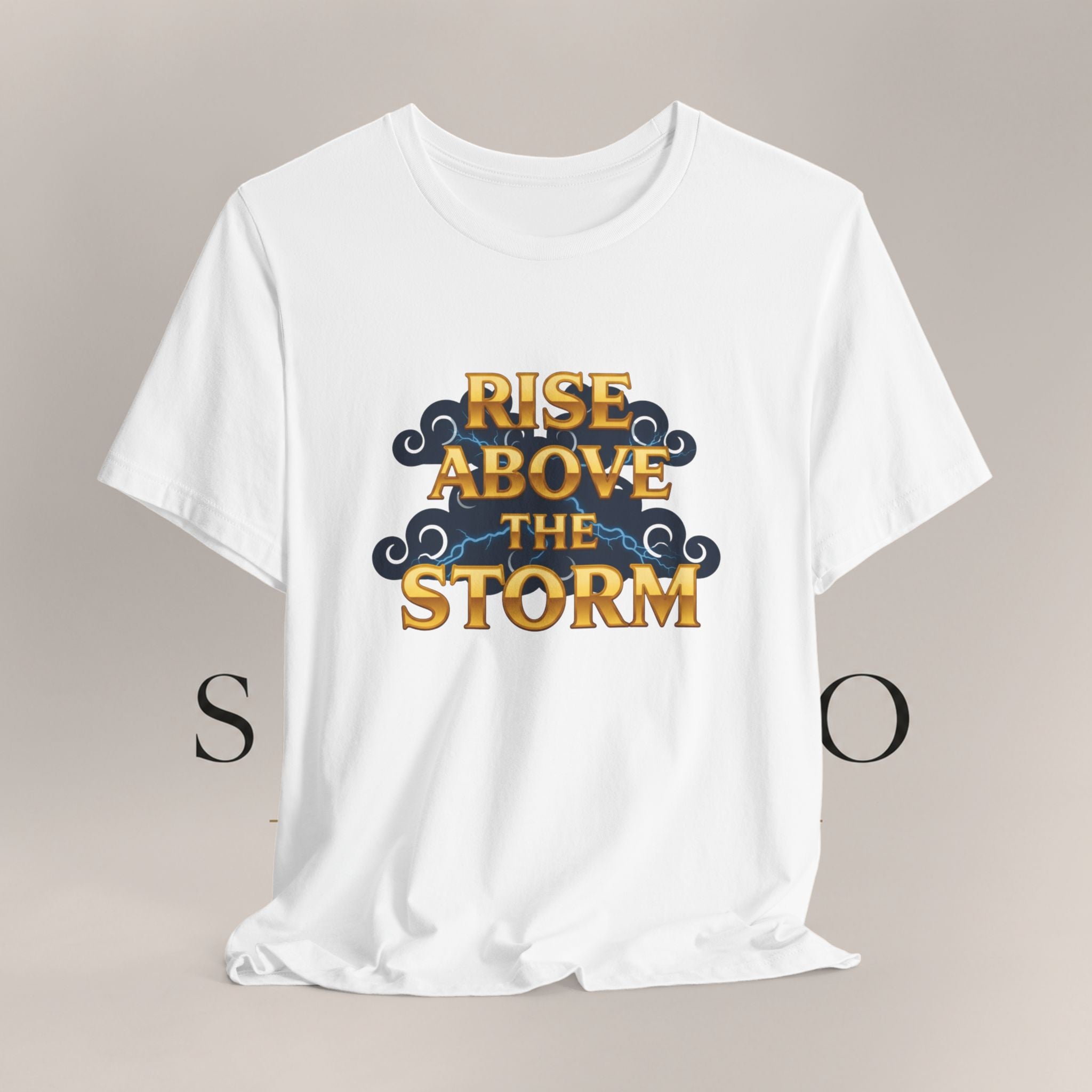 T-Shirt — "Rise Above the Storm" Inspirational Graphic Tee