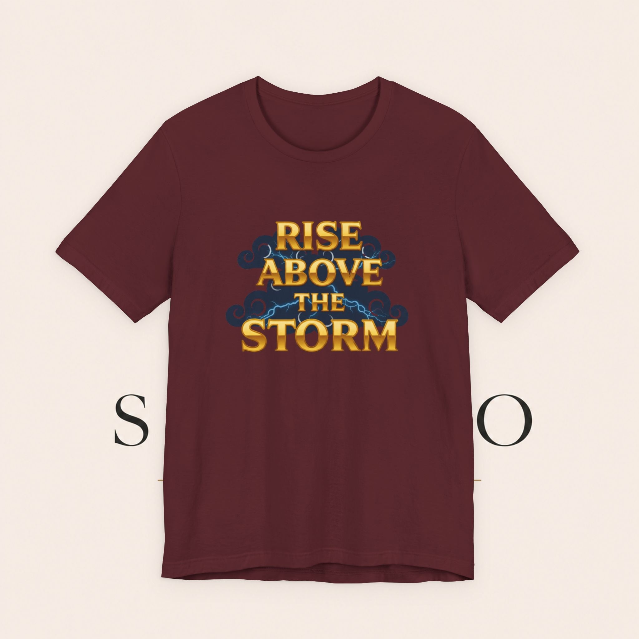 T-Shirt — "Rise Above the Storm" Inspirational Graphic Tee
